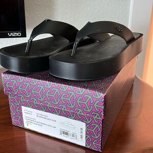 Tory Burch black leather flip flops